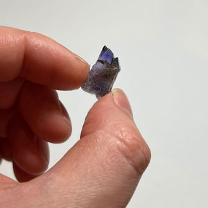 natural tanzanite size in hand