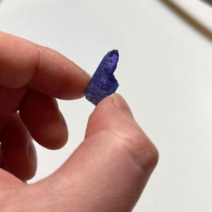 Interesting tanzanite crystal in hand