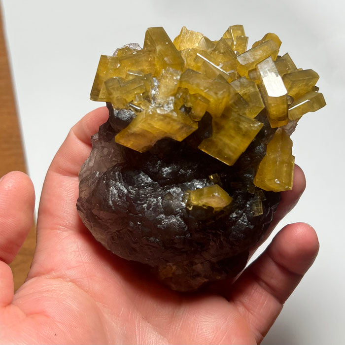 golden brown barite crystal cluster on fluorite