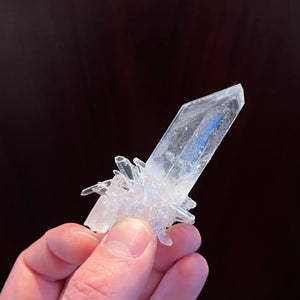 raw quartz in hand