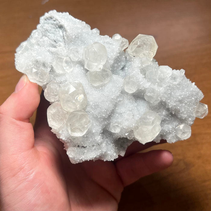 calcite crystals on silvery matrix