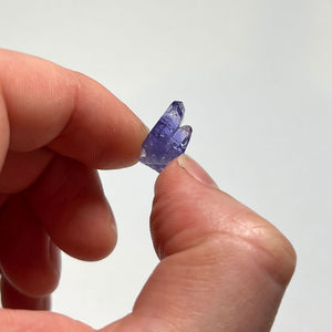 tanzanite crystal with double termination in hand