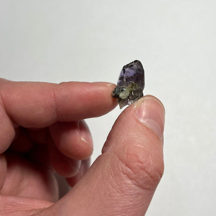 Unheated tanzanite and diopside mineral specimen