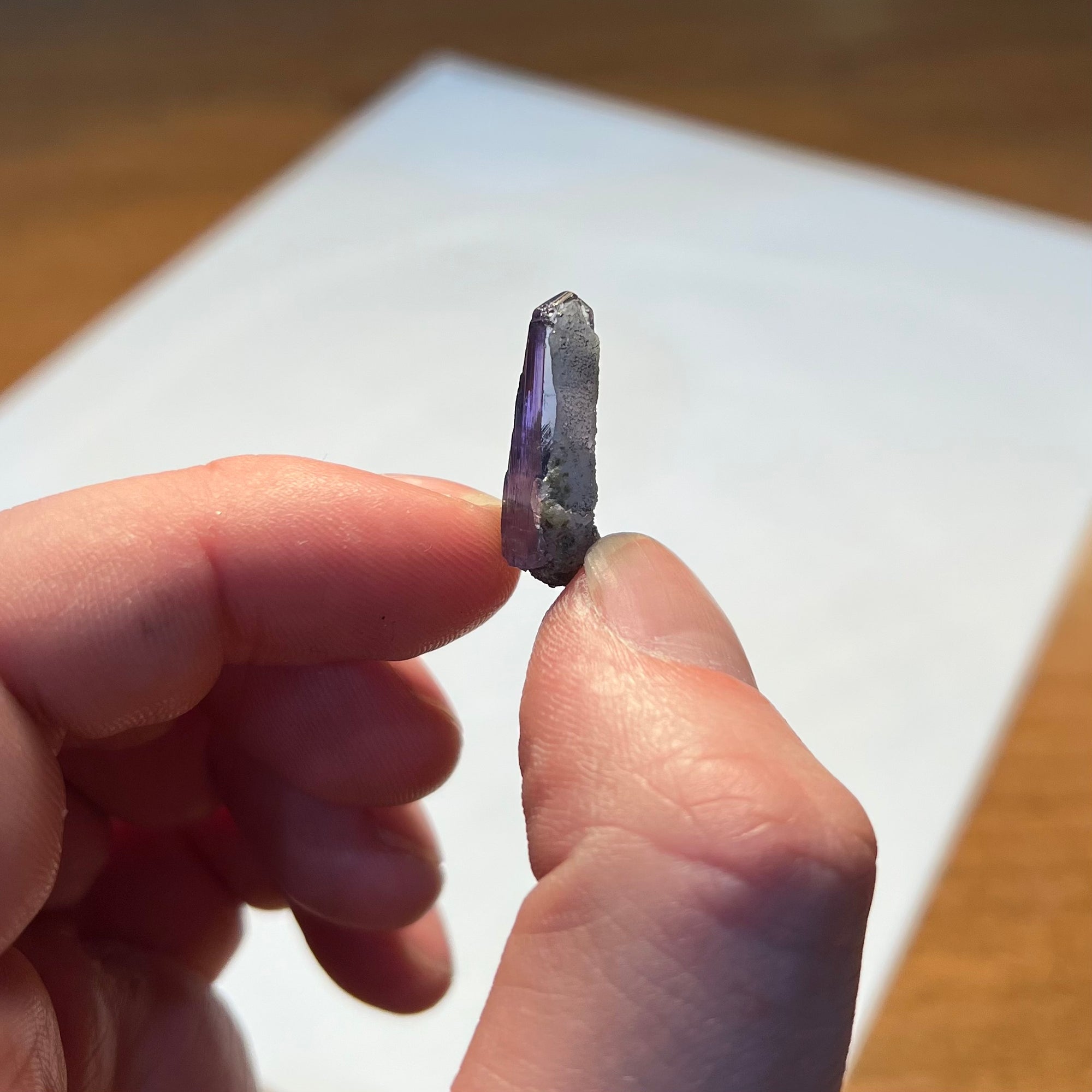 Tanzanite crystal with calcite