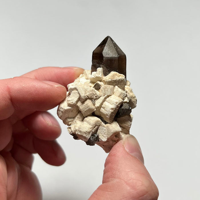 smoky quartz on feldspar