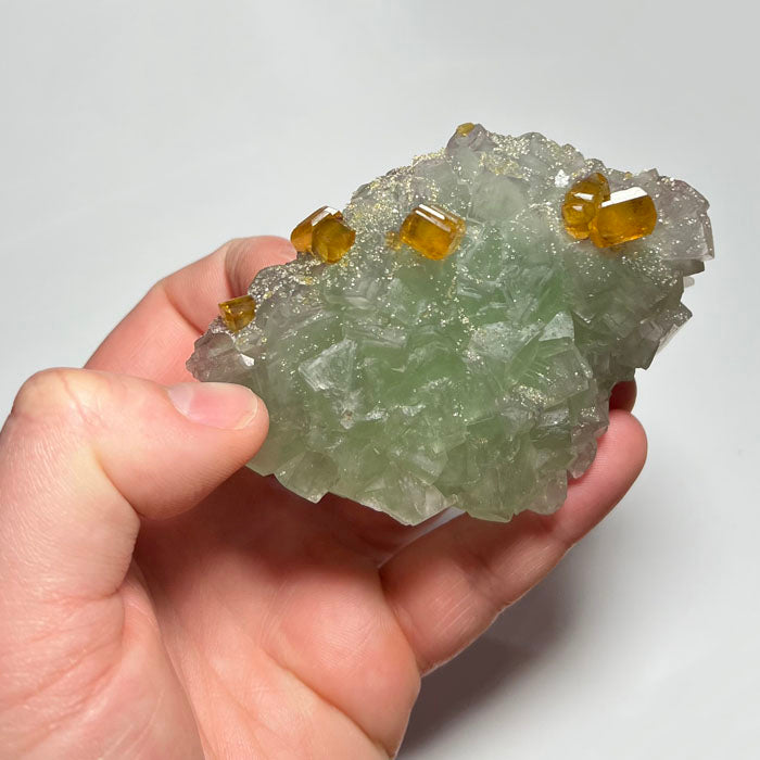 Green Fluorite with orange barite crystal specimen