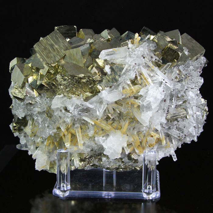 Sample of clear crystalline quartz, the substrate interspersed with small  crystals of pyrite that have a characteristic golden metallic lustre. The  qu Stock Photo - Alamy