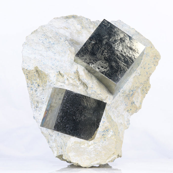 1404 - PYRITE CUBE with smaller intrusive crystal more outlet than 5 ounces and is more than 35mm wide